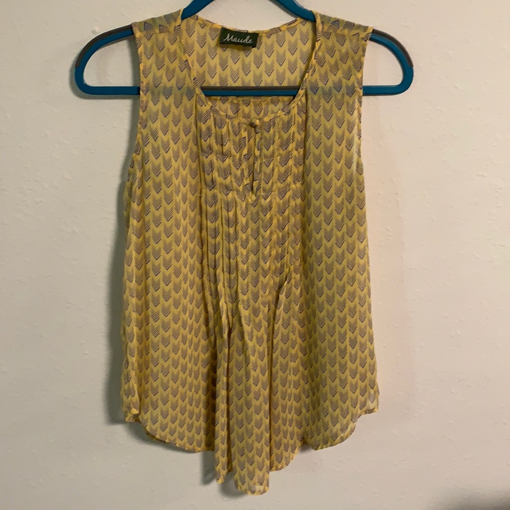 Yellow sleeveless blouse